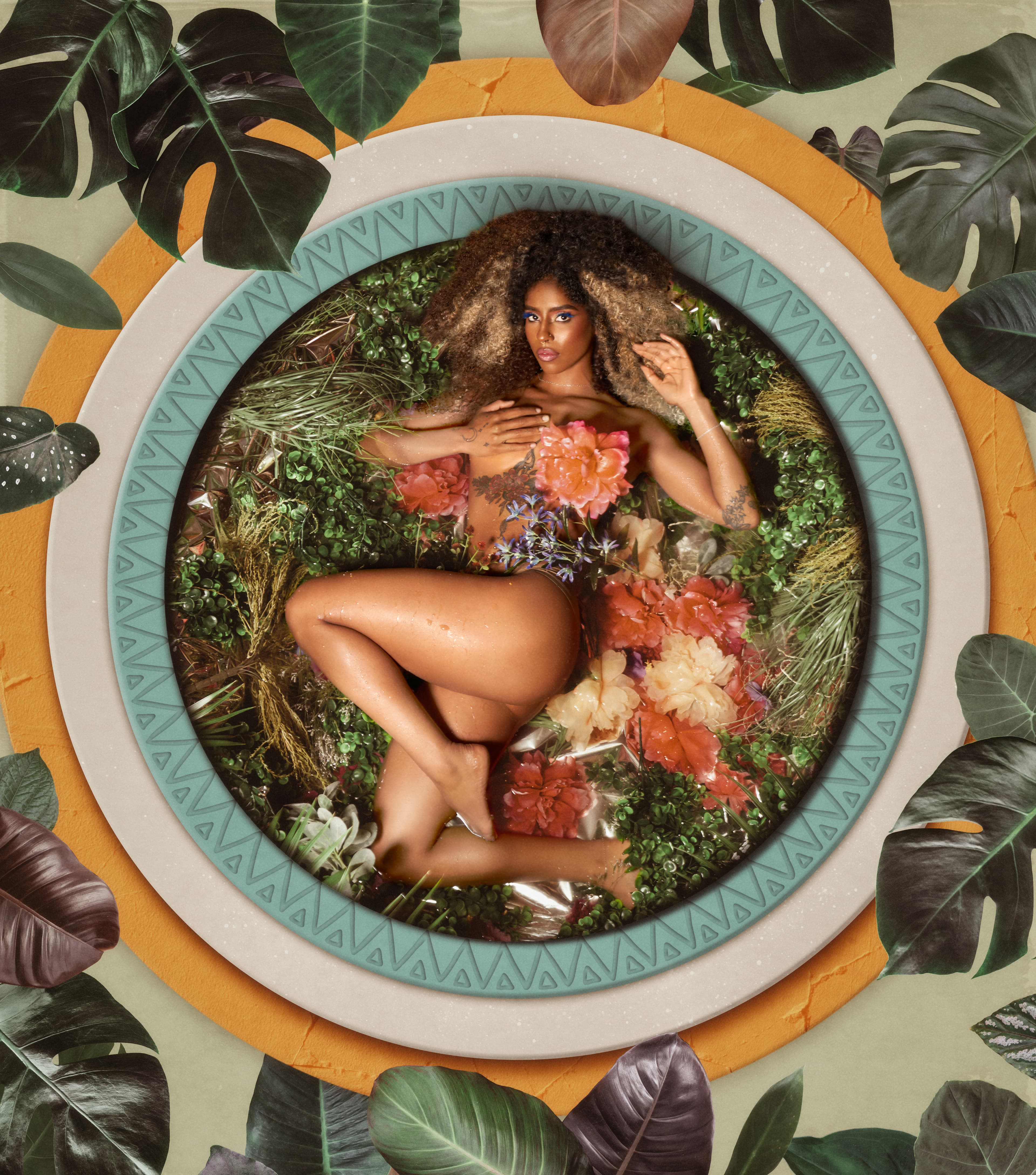 Profile portrait of a woman with teal makeup on a teal background.